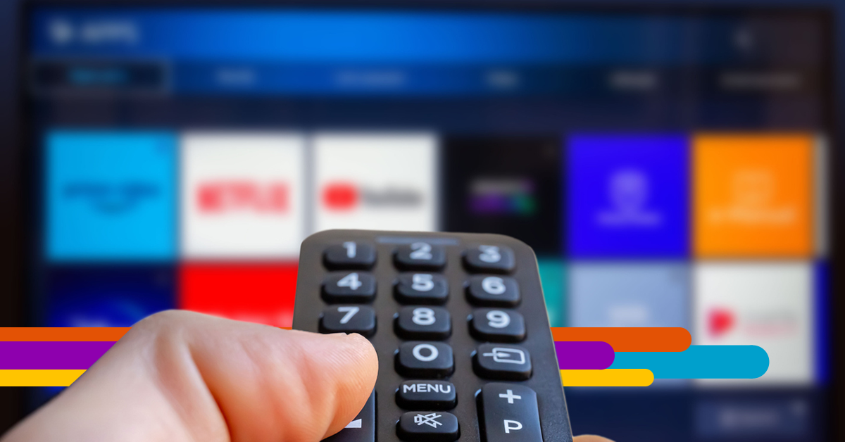 hand pointing TV remote at a screen with multiple streaming apps on it with i3 Broadband's fiber strands running through the design