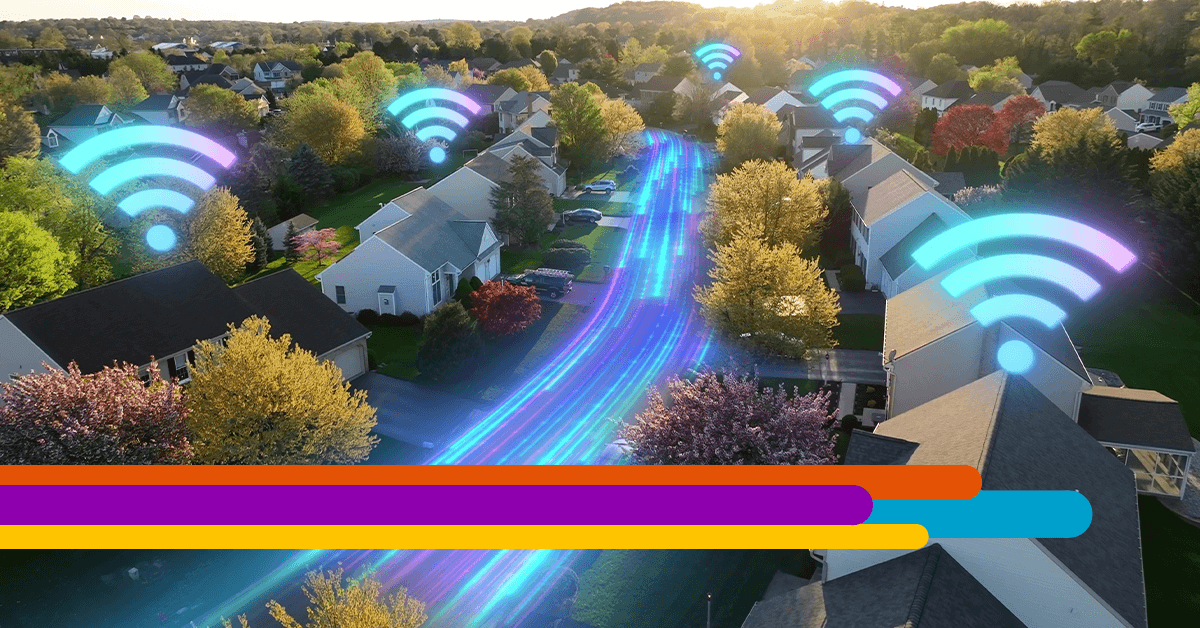 aerial shot of a residential neighborhood with blue and purple wi-fi icons above the houses