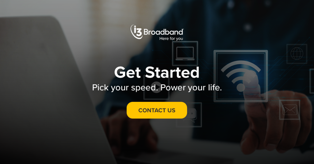 person typing on a laptop and pointing to a wi-fi icon with a call-to-action to contact i3 Broadband
